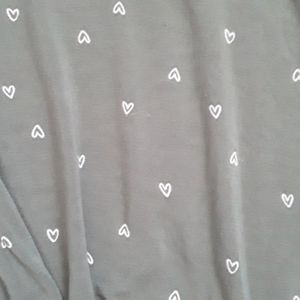 Green top with white hearts